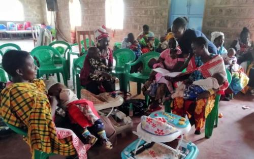 During a group meeting, Survival caregivers talk about identifying the emotional needs of their children. They also discuss fostering a positive relationship with their children. 
