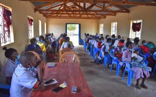 Survival mothers from AIC Kanzinwa Child Development Center meet with another Survival program from a neighboring community. They share ideas and discuss income-generating activities.