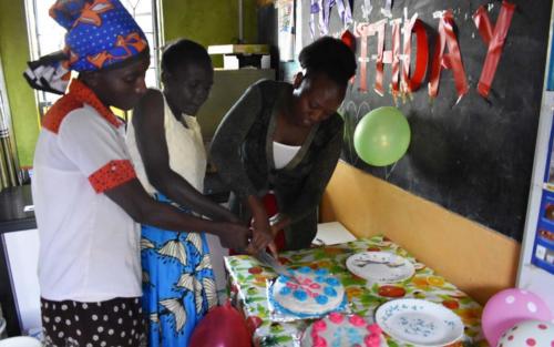 Survival mothers celebrate their children's birthdays together at the church.