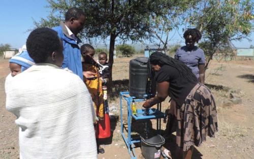 A church staff member facilitates a workshop on proper handwashing techniques. They also discuss ways to prevent the spread of COVID-19.